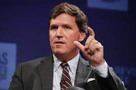 Tucker Carlson says corporations are helping their employees get an out-of-state abortion because those 'without families are much cheaper for the company'